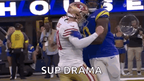 Two Football Players Hugging Sup Drama