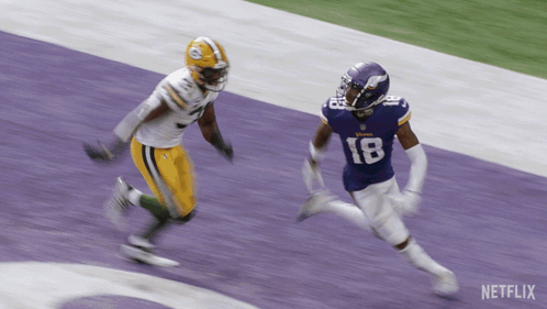 Two Football Players On A Field With Netflix Written On The Bottom GIF