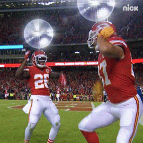 Two Football Players On Field With Nick Logo GIF