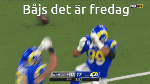 Two Football Players with Bajs Det Ar Fredag
