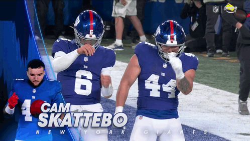 Two Giants Football Players Standing