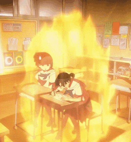 Two Girls Are Sitting At Desks In A Classroom With A Bulletin Board That Says ' Chinese ' On It GIF