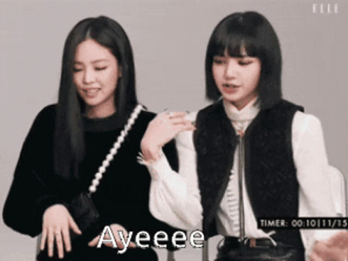 Two Girls Are Standing Next To Each Other And One Of Them Says Ayeee GIF