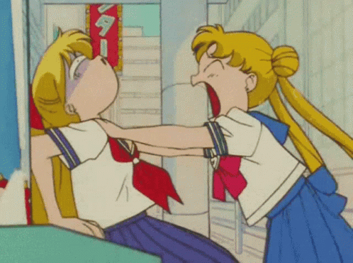 Two Girls Fighting In Front Of Sign GIF