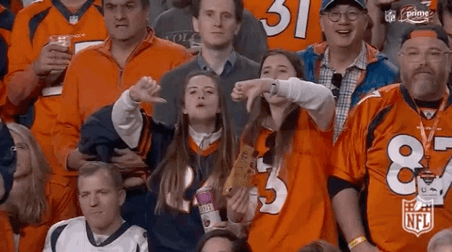 Two Girls Giving Booo To The Crowd GIF