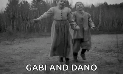 Two Girls Holding Hands Jumping