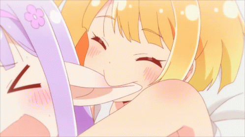 Two Girls Laying On Bed GIF
