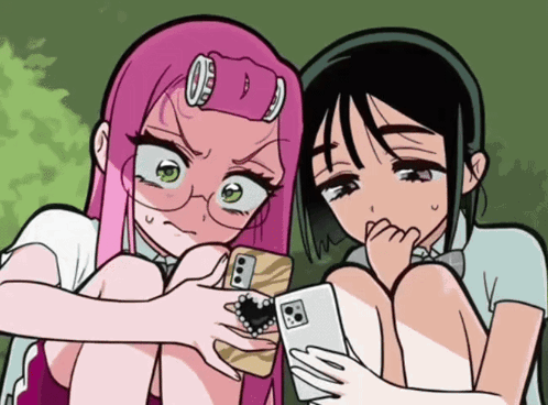 Two Girls Looking at a Phone