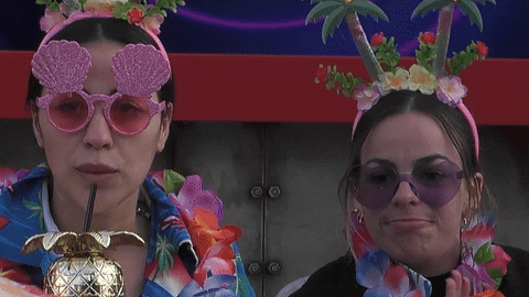 Two Girls Making Meh Face GIF