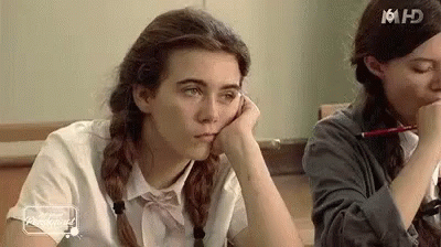 Two Girls Sitting in Classroom