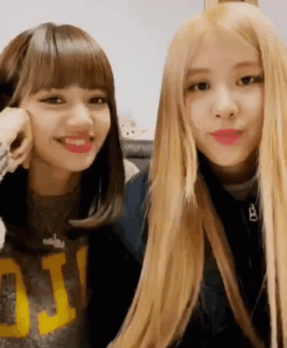 Two Girls Smiling at Camera