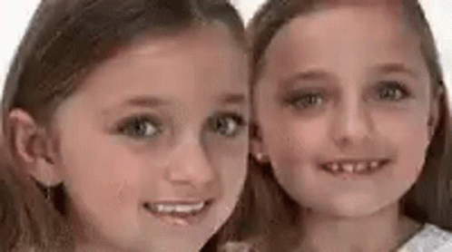 Two Girls Smiling for Photo