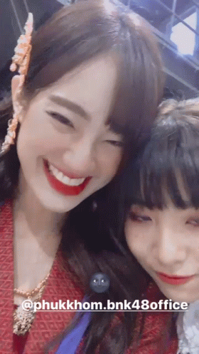 Two Girls Smiling for Picture @phukkhom.bnk48office