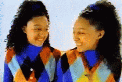 Two Girls Smiling Together