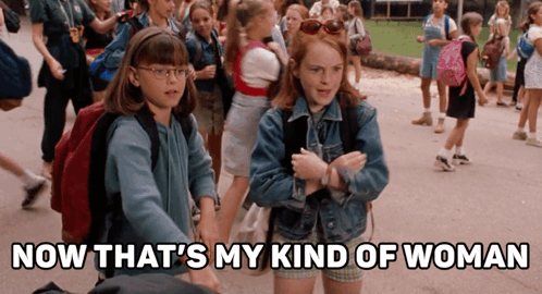 Two Girls Standing Next To Each Other With The Words Now That 'S My Kind Of Woman GIF