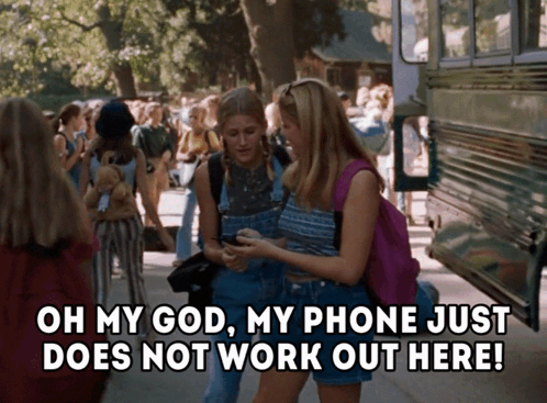 Two Girls Standing Next To Each Other With The Words Oh My God My Phone Just Does Not Work Out Here On The Bottom GIF