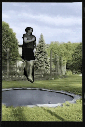 Two Girls Walking In Park With Hysteria Sweatshirt GIF