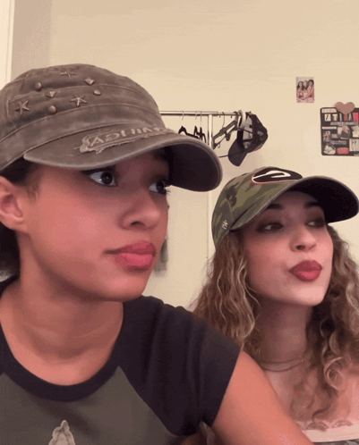 Two Girls Wearing Ashland Hats