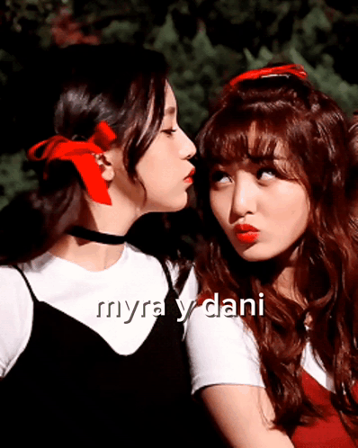 Two Girls With Red Ribbons Kissing With Myra Y Dani GIF