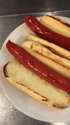 Two Glizzy Hotdog On Plate GIF