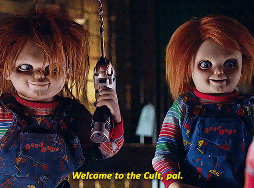 two good guys dolls are standing next to each other holding guns and saying welcome to the cult pal