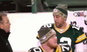 Two Green Bay Packers Players Talking To Man GIF