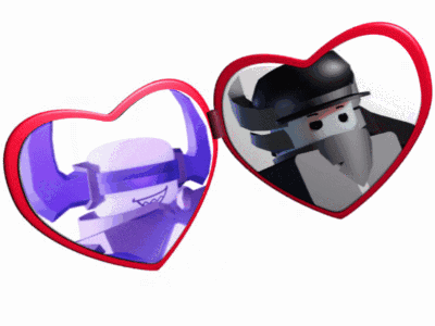Two Heart Shaped Mirrors With A Picture Of A Man In A Hat GIF