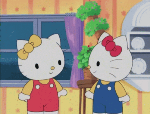 Two Hello Kitty Characters Standing