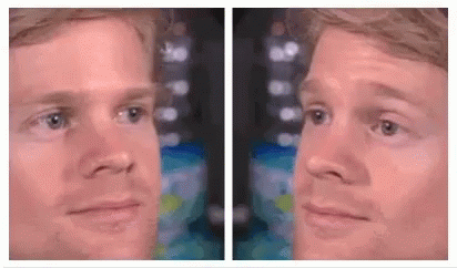 Two Images Of A Man 'S Face , One Of Which Is A Reflection Of Another Man 'S Face . GIF
