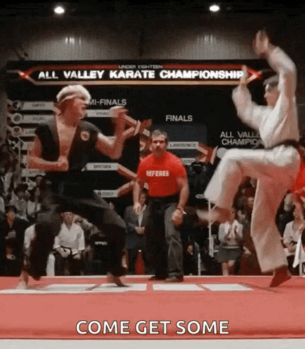 Two Karate Fighters Jumping Come Get Some GIF