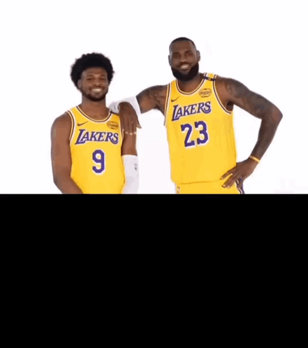 Two Lakers Players Are Posing For A Photo Together GIF