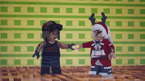 Two Lego Figures Are Standing Next To Each Other And One Is Wearing A Reindeer Hat GIF