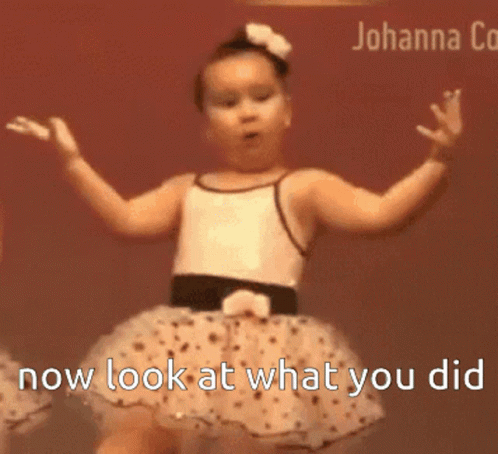 Two Little Girls Dancing With The Words Now Look At What You Did GIF