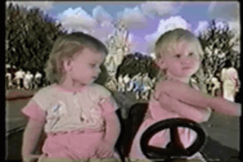 Two Little Girls In Toy Car GIF