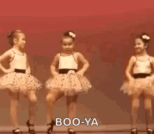 Two Little Girls in Tutus Dancing Saying Boo-Ya
