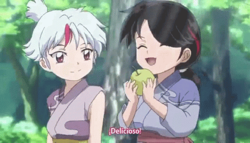 Two Little Girls Standing Together One Holding Apple GIF