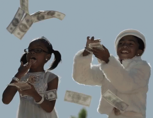 Two Little Girls Throwing Money in the Air