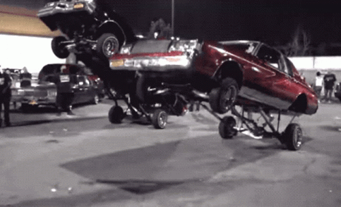 Two Lowrider Cars GIF