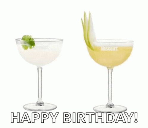 Two Martini Glasses With The Words " Happy Birthday " Written On The Bottom GIF