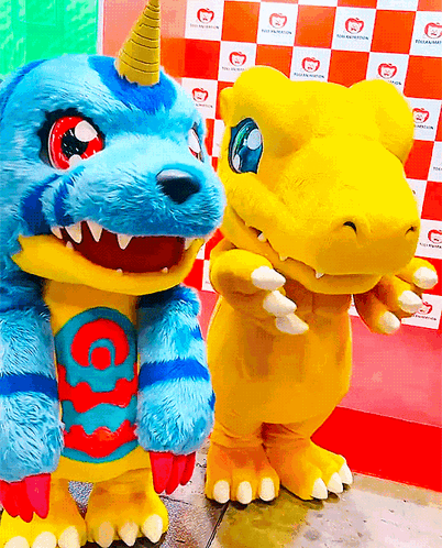 Two Mascots Are Standing Next To Each Other And One Has A Horn GIF