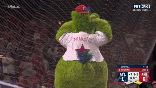 Two Mascots On Baseball Field, One In Phillies GIF
