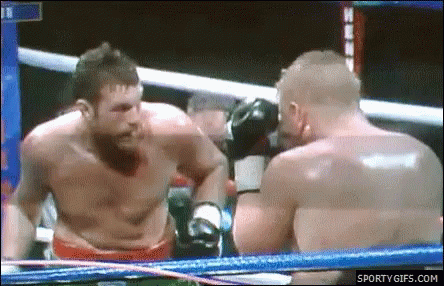 Two Men Are Boxing In A Ring With Sportygifs.com At The Bottom Of The Screen GIF