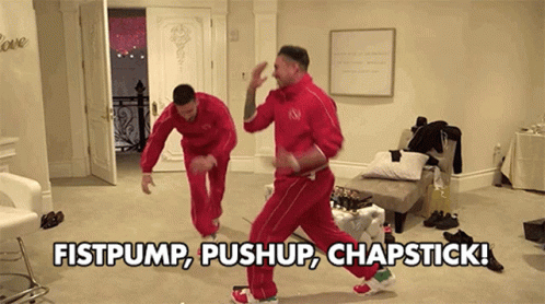 Two Men Are Dancing In A Room With The Words Fistpump Push Up Chapstick GIF