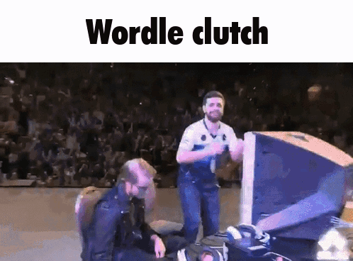 Two Men Are Dancing In Front Of A Crowd And The Words Wordle Clutch Are On The Screen GIF
