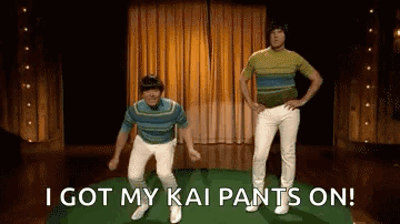 Two Men Are Dancing On A Stage With The Words `` I Got My Kai Pants On '' Written Below Them . GIF