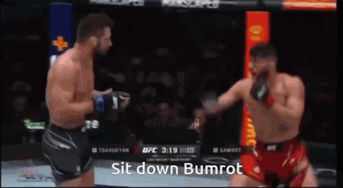 Two Men Are Fighting In A Boxing Match And One Of Them Says Sit Down Bumrot On The Screen GIF