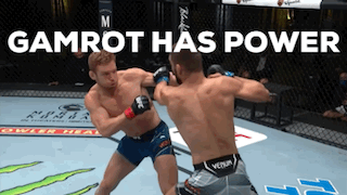 Two Men Are Fighting In A Boxing Ring And The Words Gamrot Has Power Are Above Them GIF