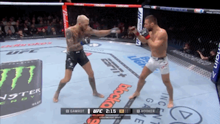 Two Men Are Fighting In A Boxing Ring Sponsored By Budweiser And Ufc GIF