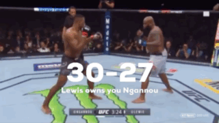 Two Men Are Fighting In A Boxing Ring With A Monster Energy Logo On The Ground GIF