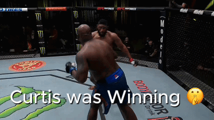 Two Men Are Fighting In A Boxing Ring With The Words Curtis Was Winning GIF